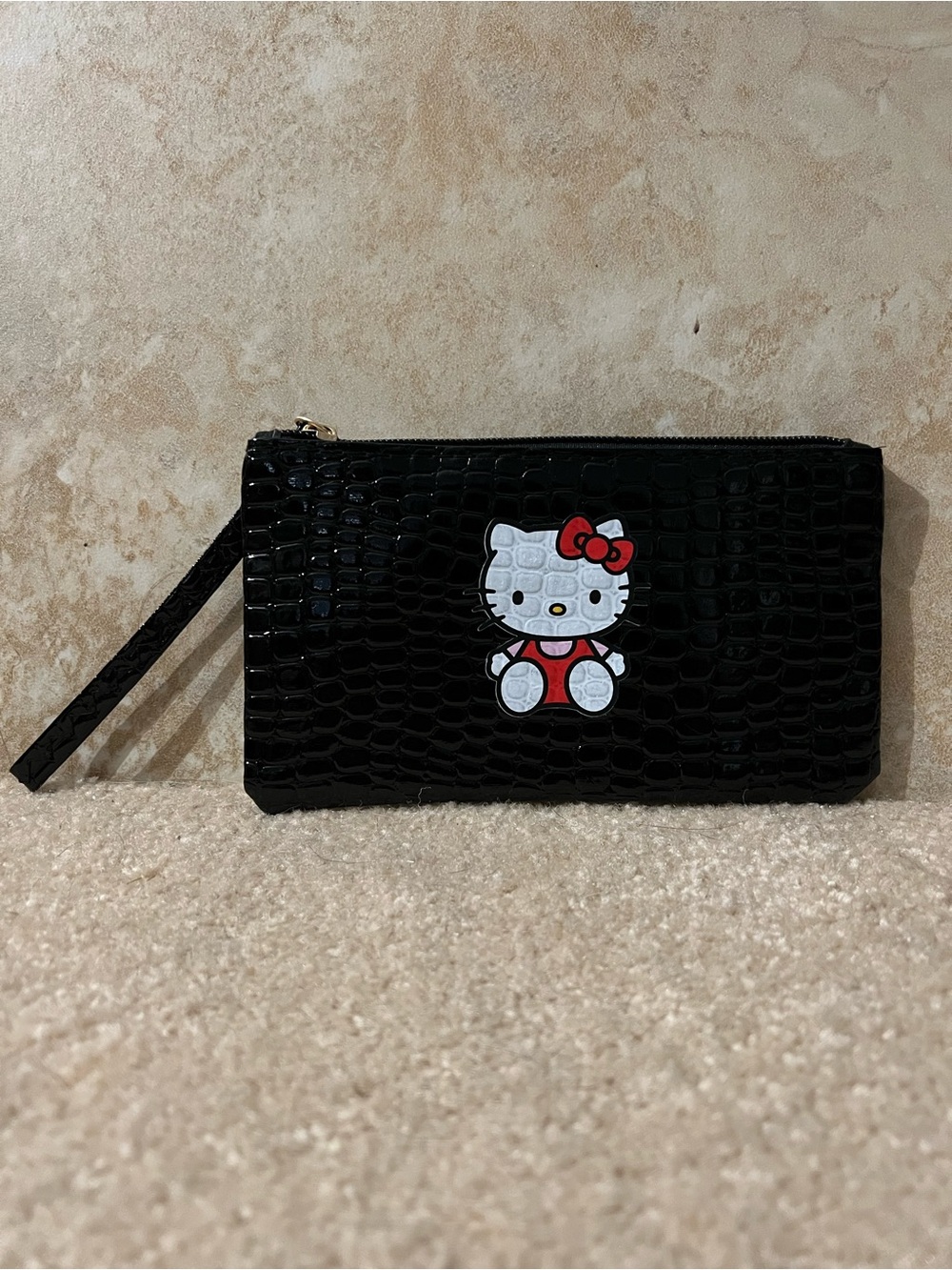 Hello Kitty Black Croc-Embossed Mini Wristlet with Red Accent
